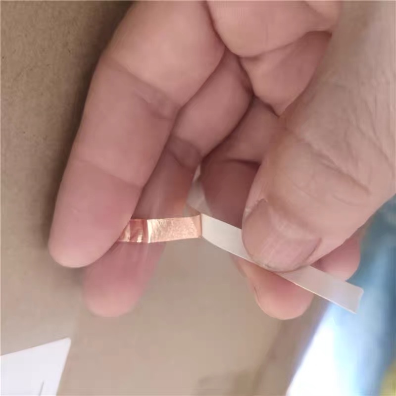 Adhesive backing and release liner